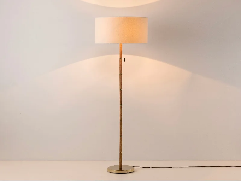 Wooden and brass disk floor lamp